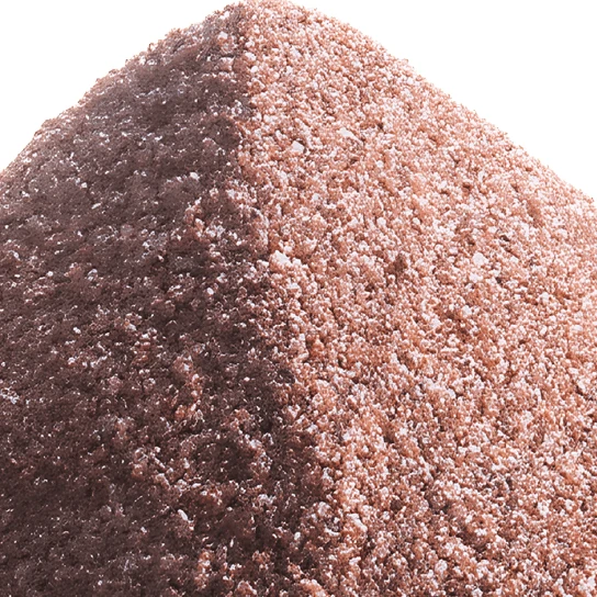 Pinkish-red garnet grains in a heap