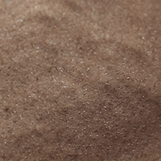Light reddish-brown zircon sand